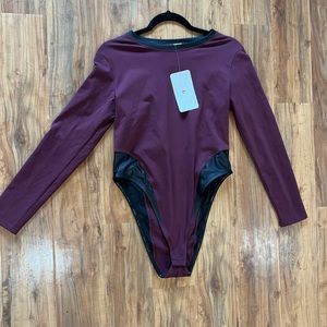 Burgundy fabletics NWT body suit size large